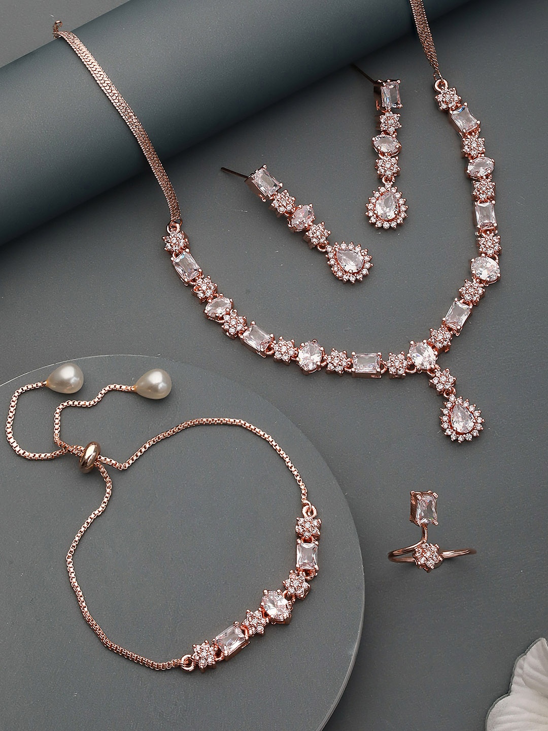 

Saraf RS Jewellery Rose Gold Plated AD Studded Designer Jewellery Set