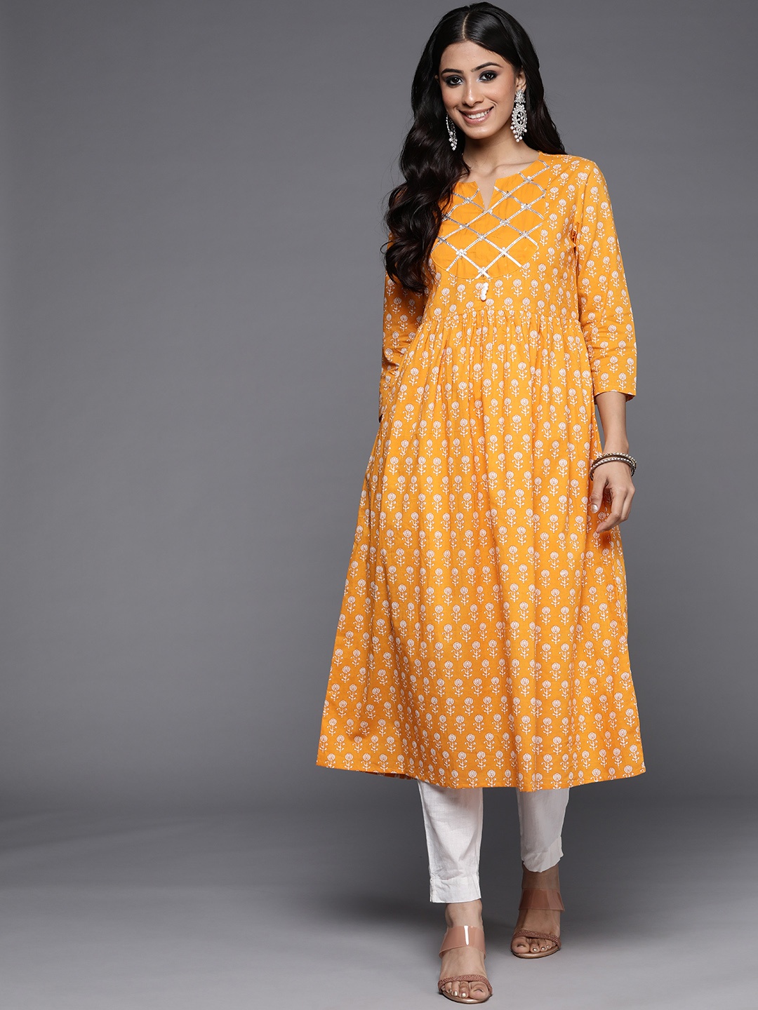 

Varanga Women Mustard Yellow & White Floral Printed Anarkali Kurta