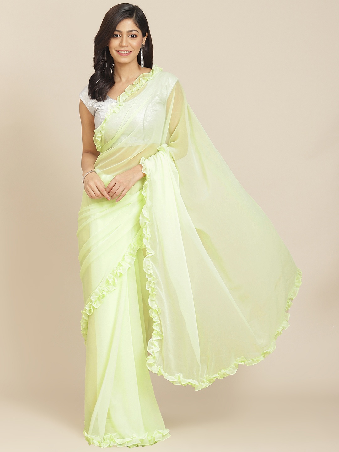 

Tikhi Imli Green Solid Frill Border Saree
