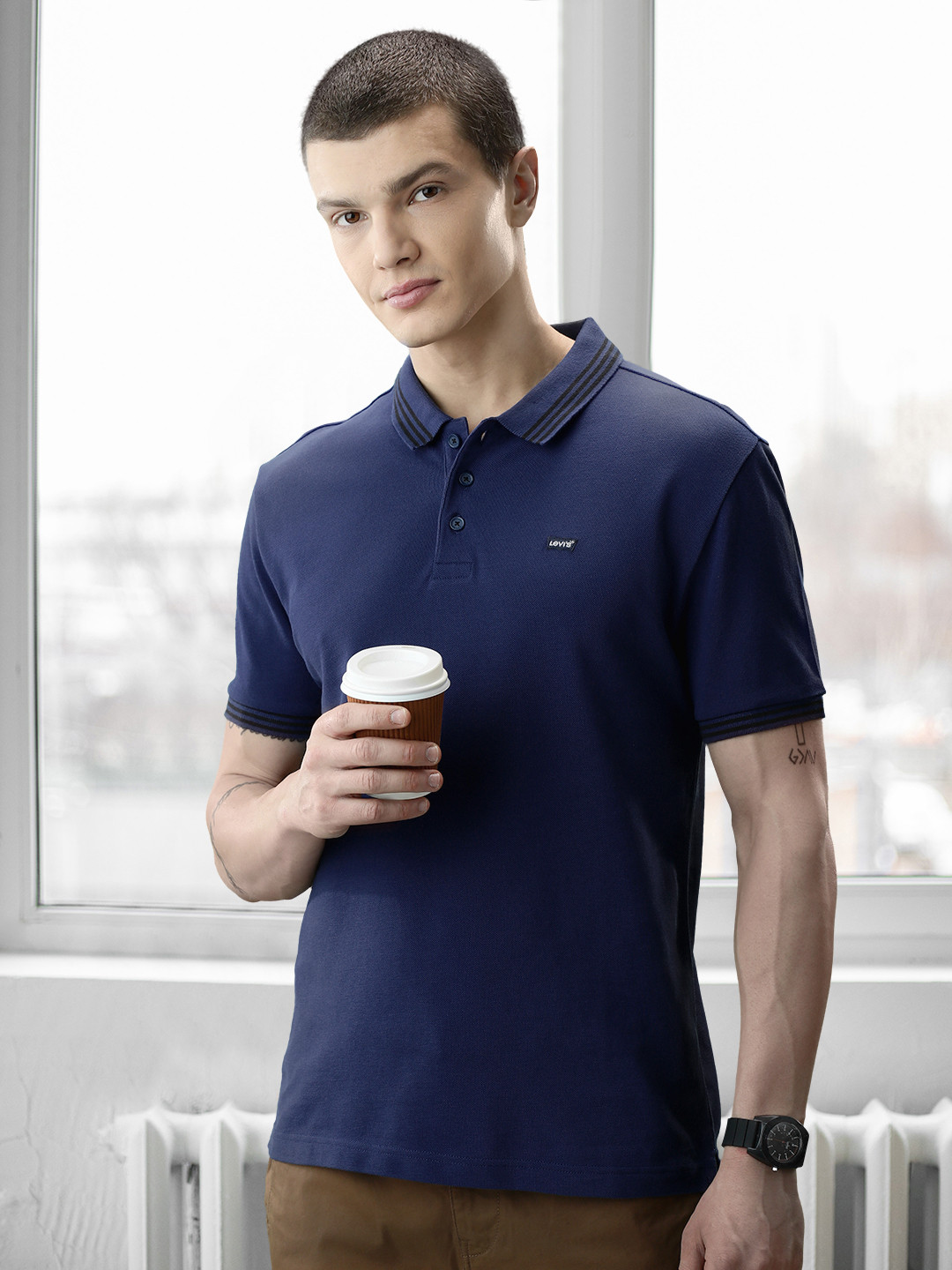 

Levis Men Dark Blue Solid Polo Collar Pure Cotton T-shirt