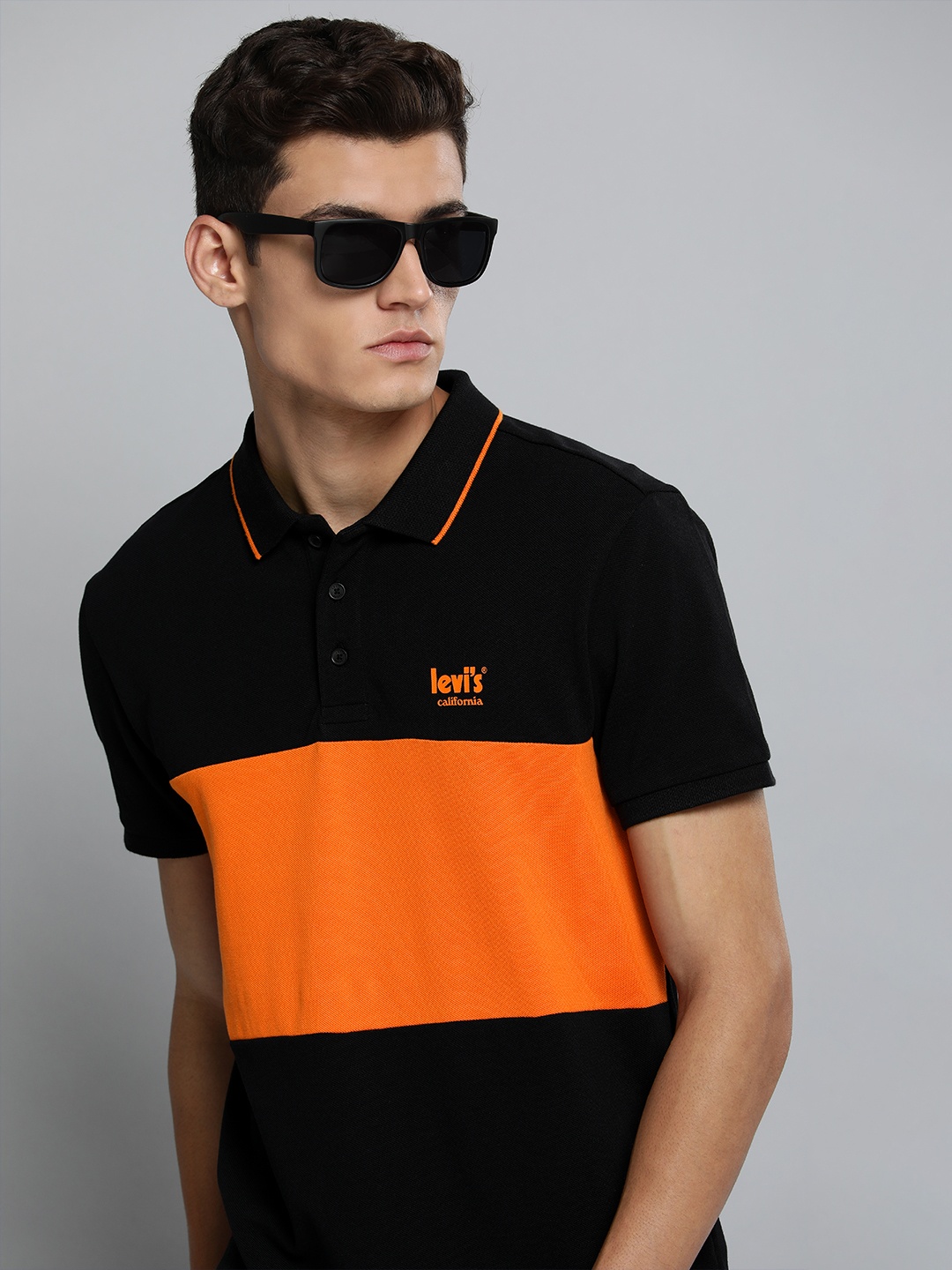 

Levis Men Black & Orange Colourblocked Polo Collar Pure Cotton Casual T-shirt