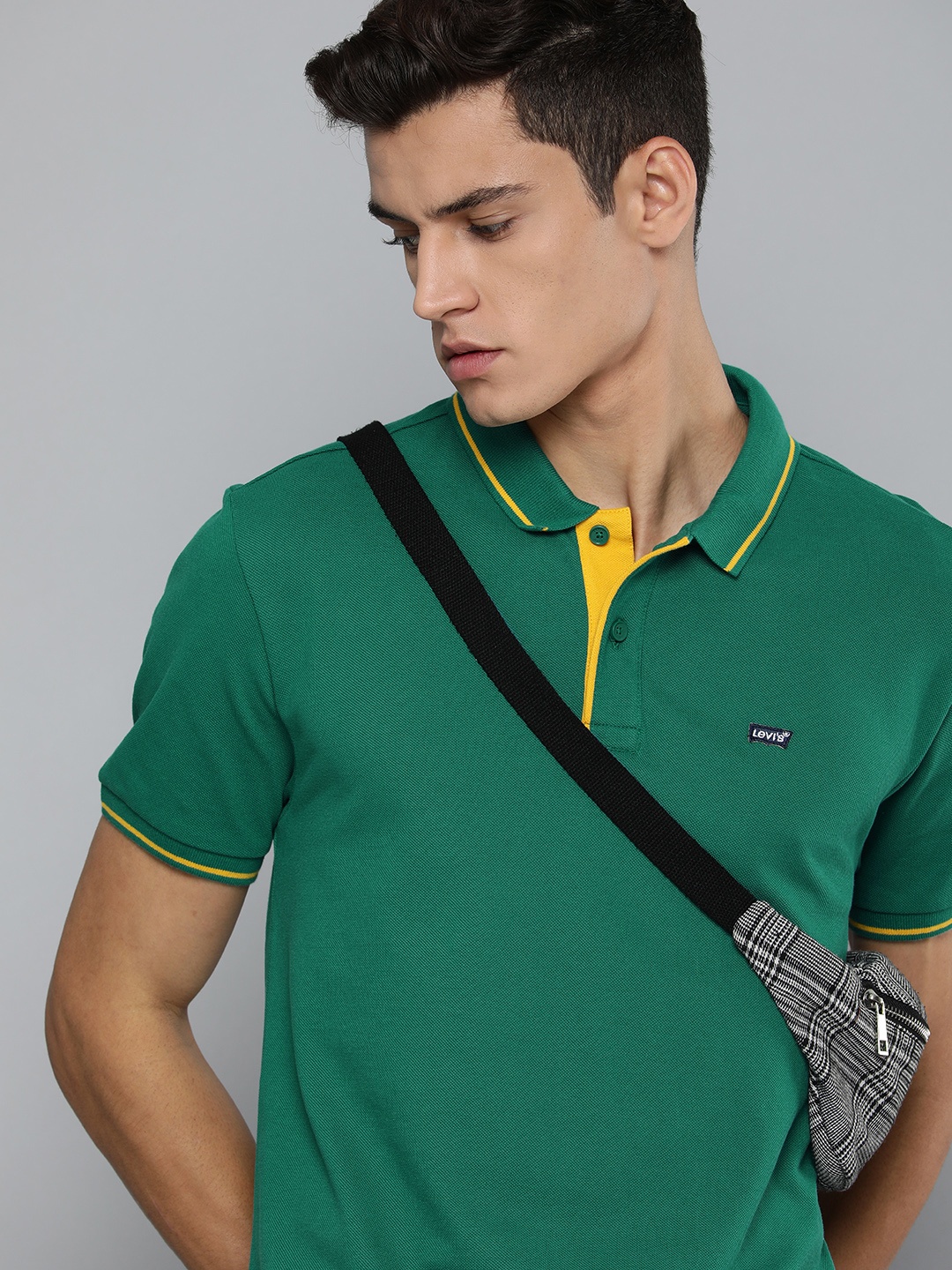 

Levis Men Green Solid Polo Collar Pure Cotton Casual T-shirt