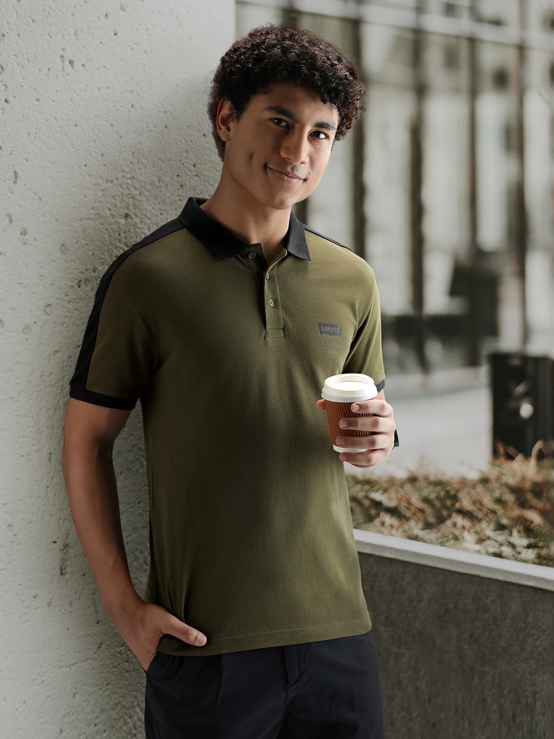 

Levis Men Olive Green & Black Polo Collar Pure Cotton T-shirt