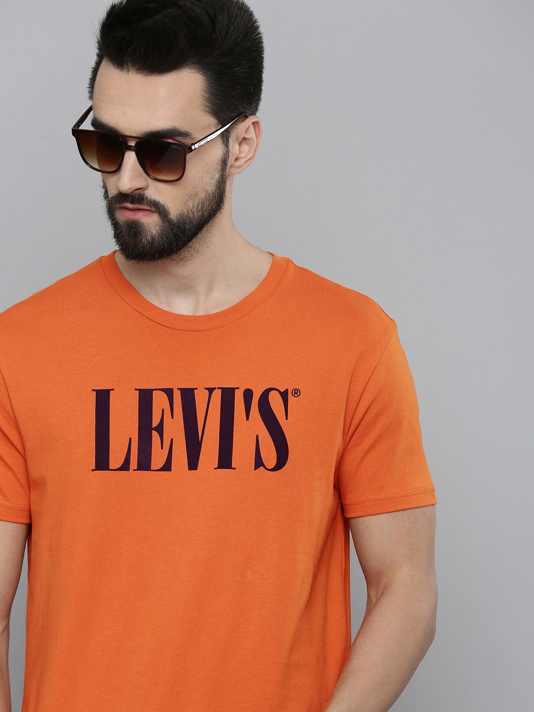 

Levis Men Orange & Black Typography Printed Pure Cotton Casual T-shirt
