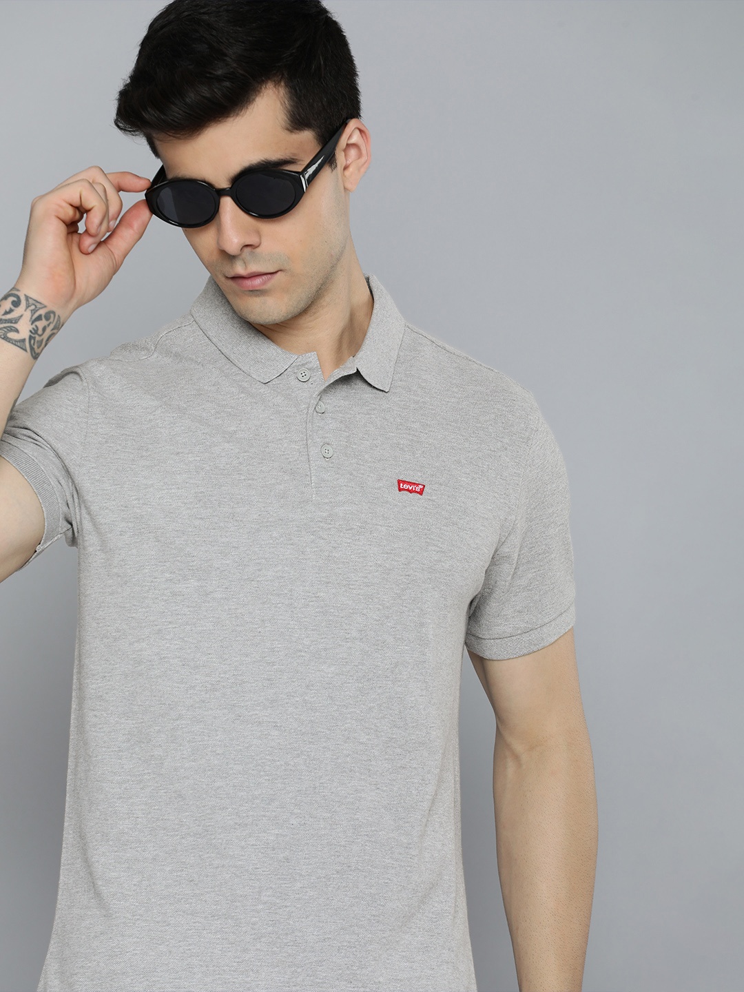 

Levis Men Grey Melange Self Design Polo Collar Pure Cotton T-shirt