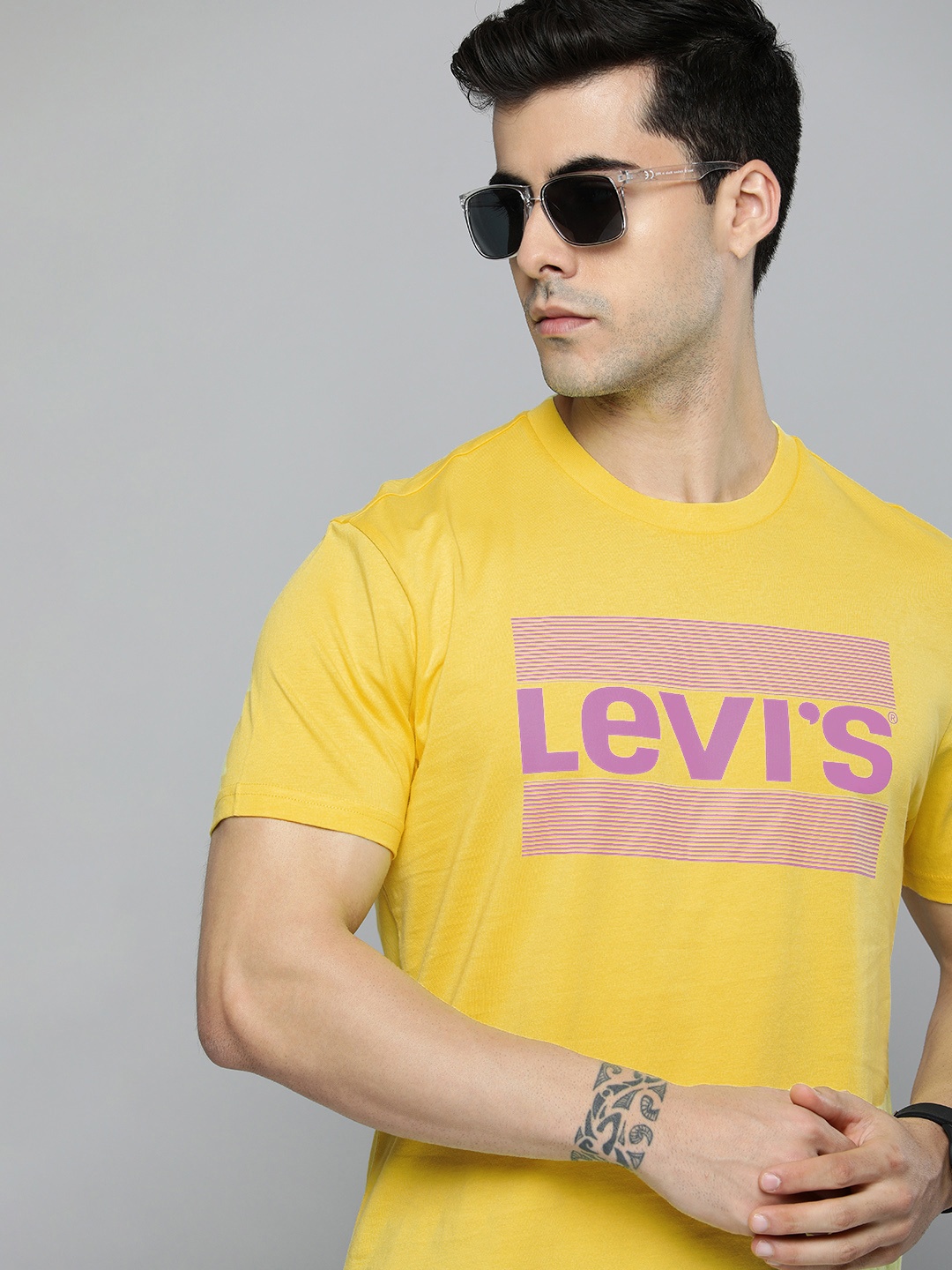 

Levis Men Yellow & Purple Brand Logo Printed Pure Cotton T-shirt