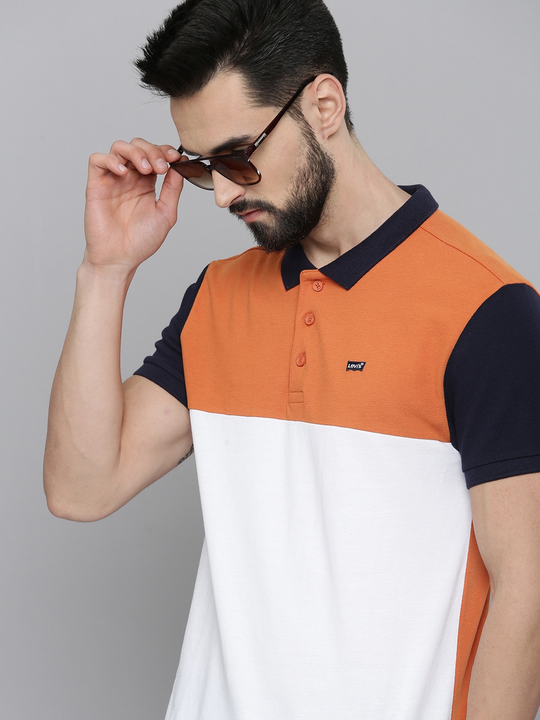 

Levis Men White & Orange Colourblocked Polo Collar Pure Cotton Casual T-shirt