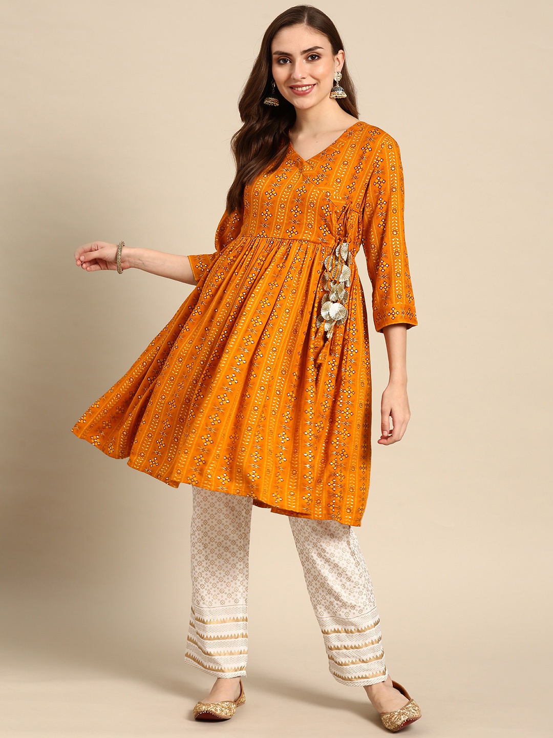 

Prakhya Women Orange Ethnic Motifs Printed Angrakha Kurta with Trousers