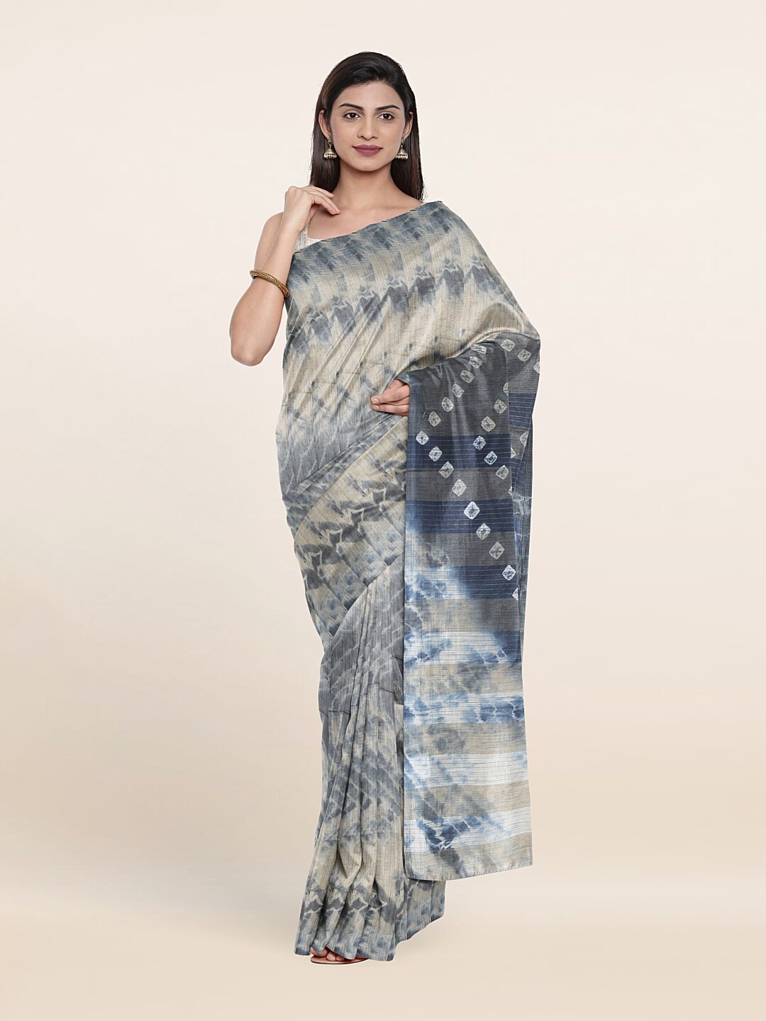 

Pothys Blue & Beige Tie and Dye Jute Cotton Saree