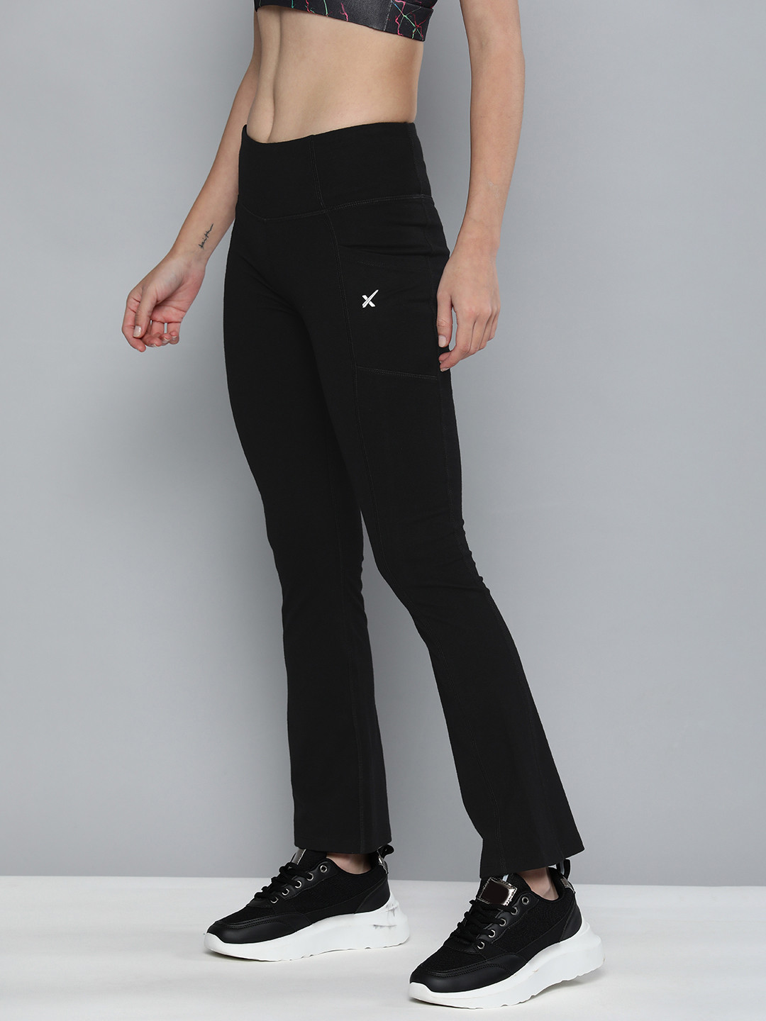 

HRX By Hrithik Roshan Women Black Yoga Rapid-Dry Technology Flared Tights