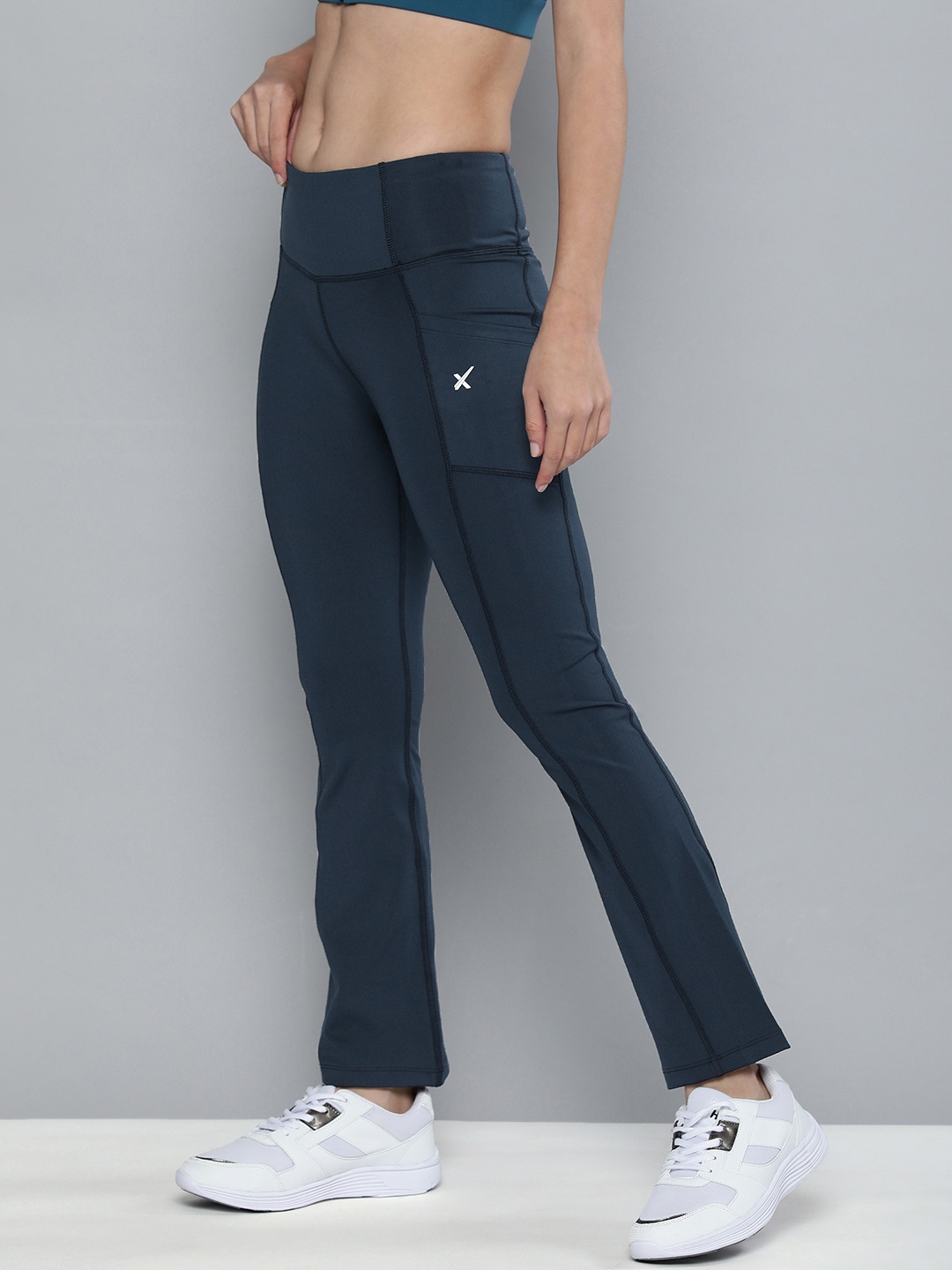 

HRX By Hrithik Roshan Women Teal Blue Yoga Rapid-Dry Technology Flared Tights