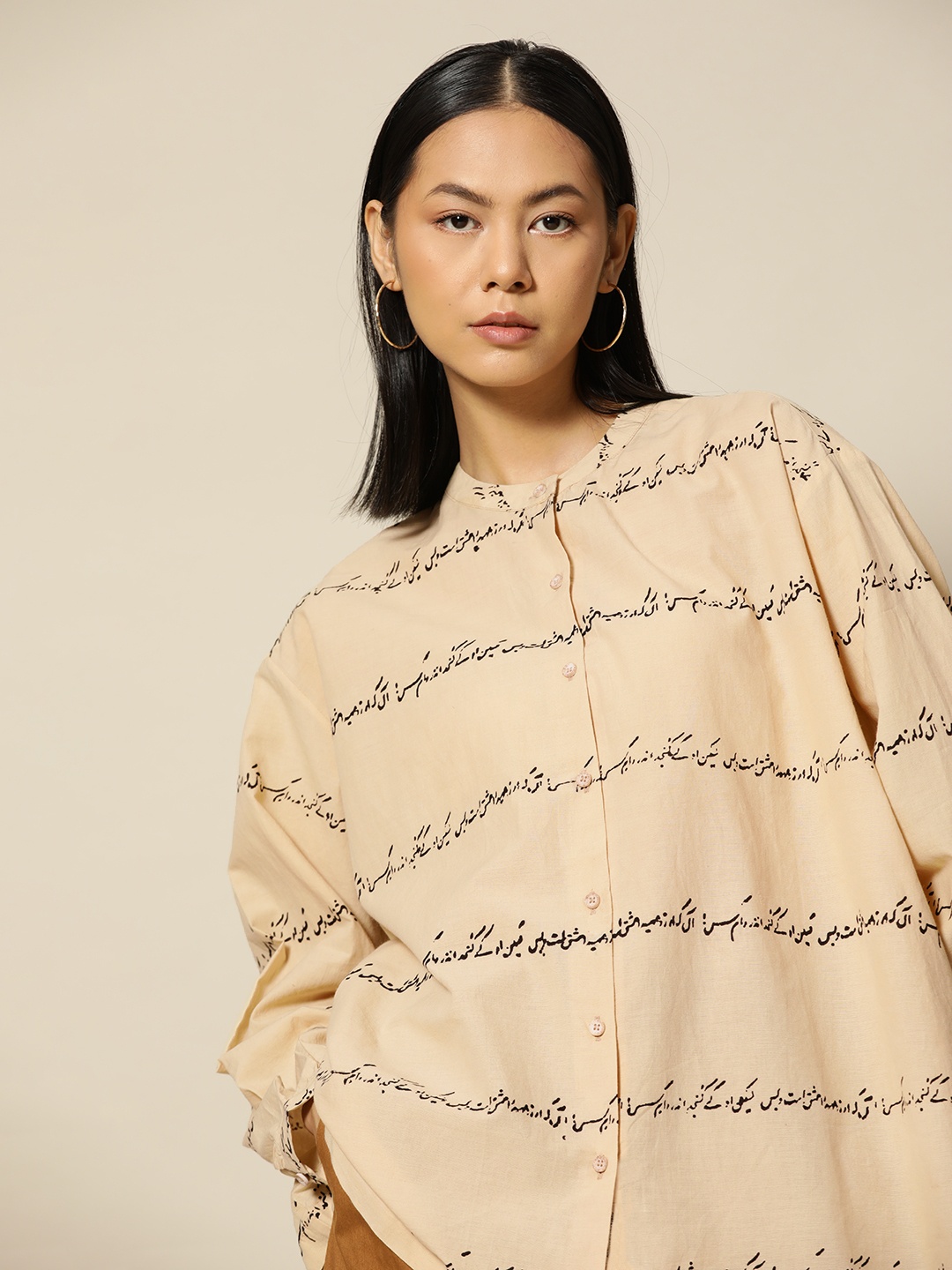 

BOWER Women Beige & Black Rumi Love Block Printed Oversized Casual Shirt