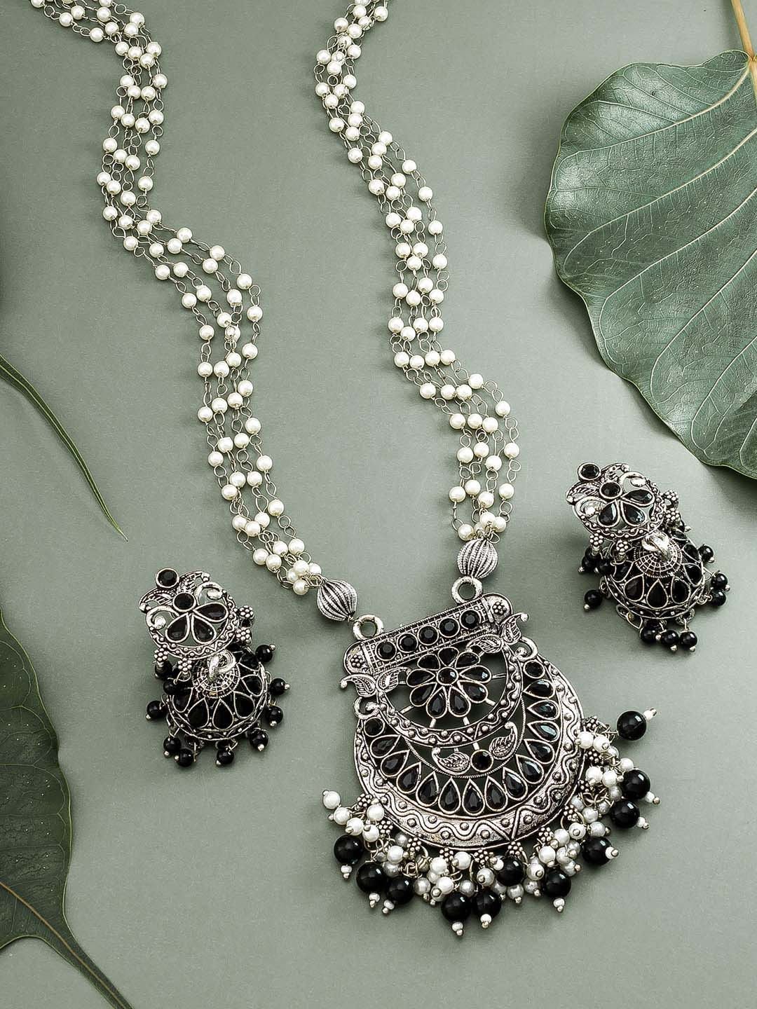 

aadita Silver-Toned & Black Stones-Studded & Beaded Matinee Jewellery Set