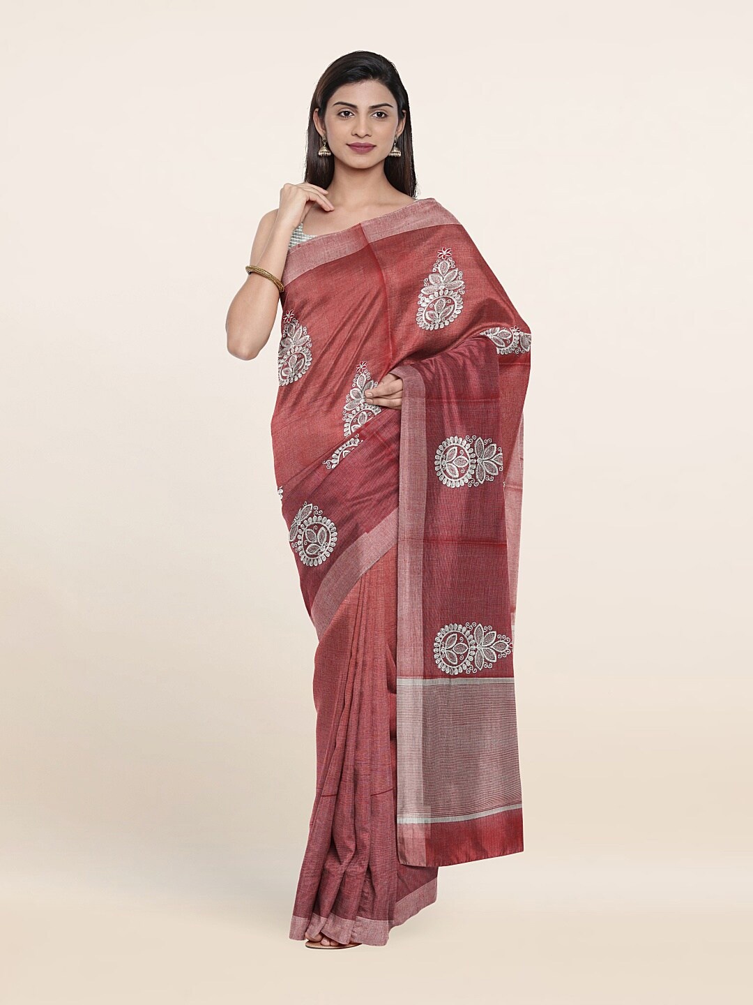 

Pothys Rust & Silver-Toned Ethnic Motifs Zari Tissue Saree