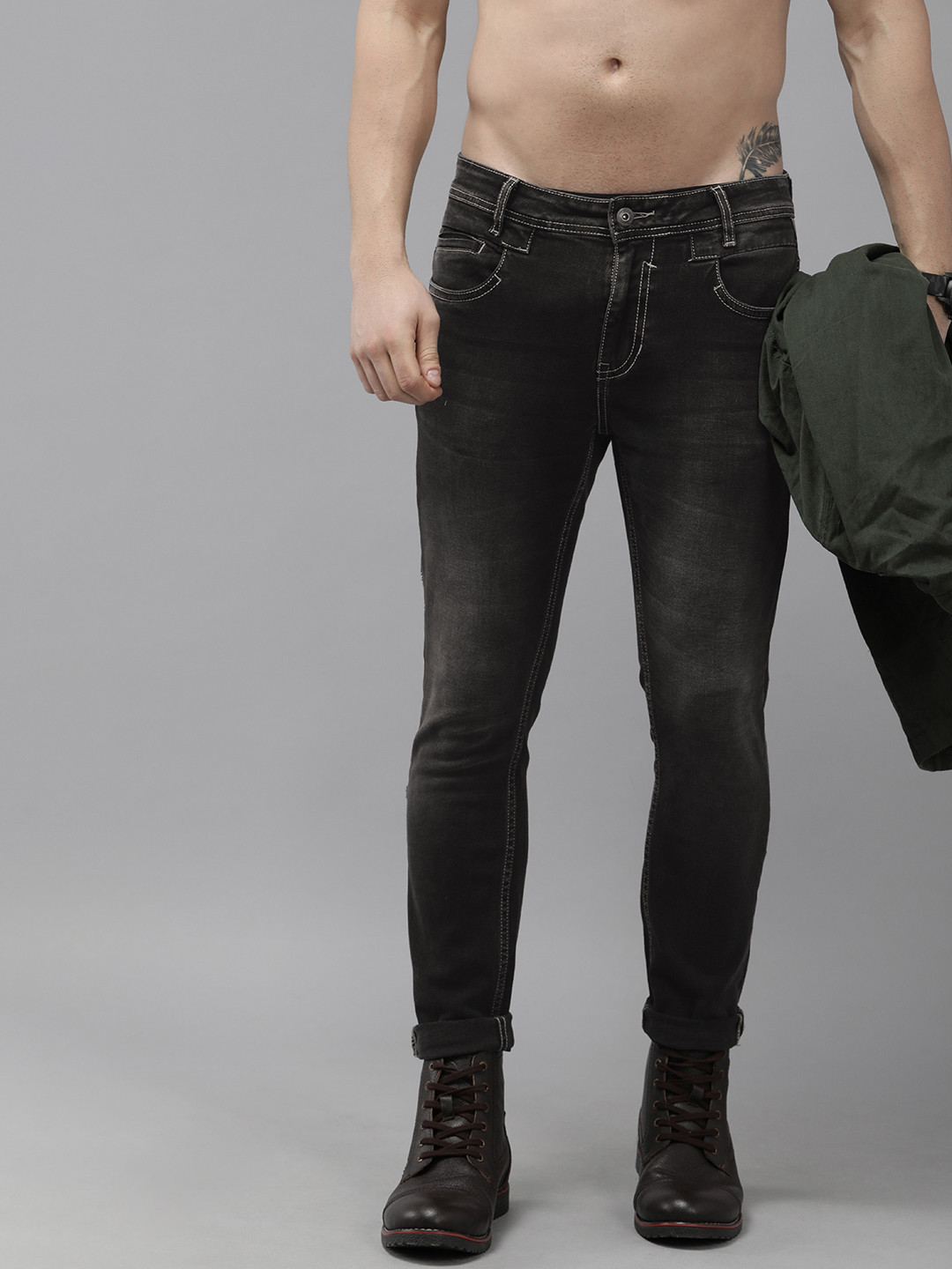 

The Roadster Lifestyle Co Men Black Skinny Fit Light Fade Stretchable Jeans