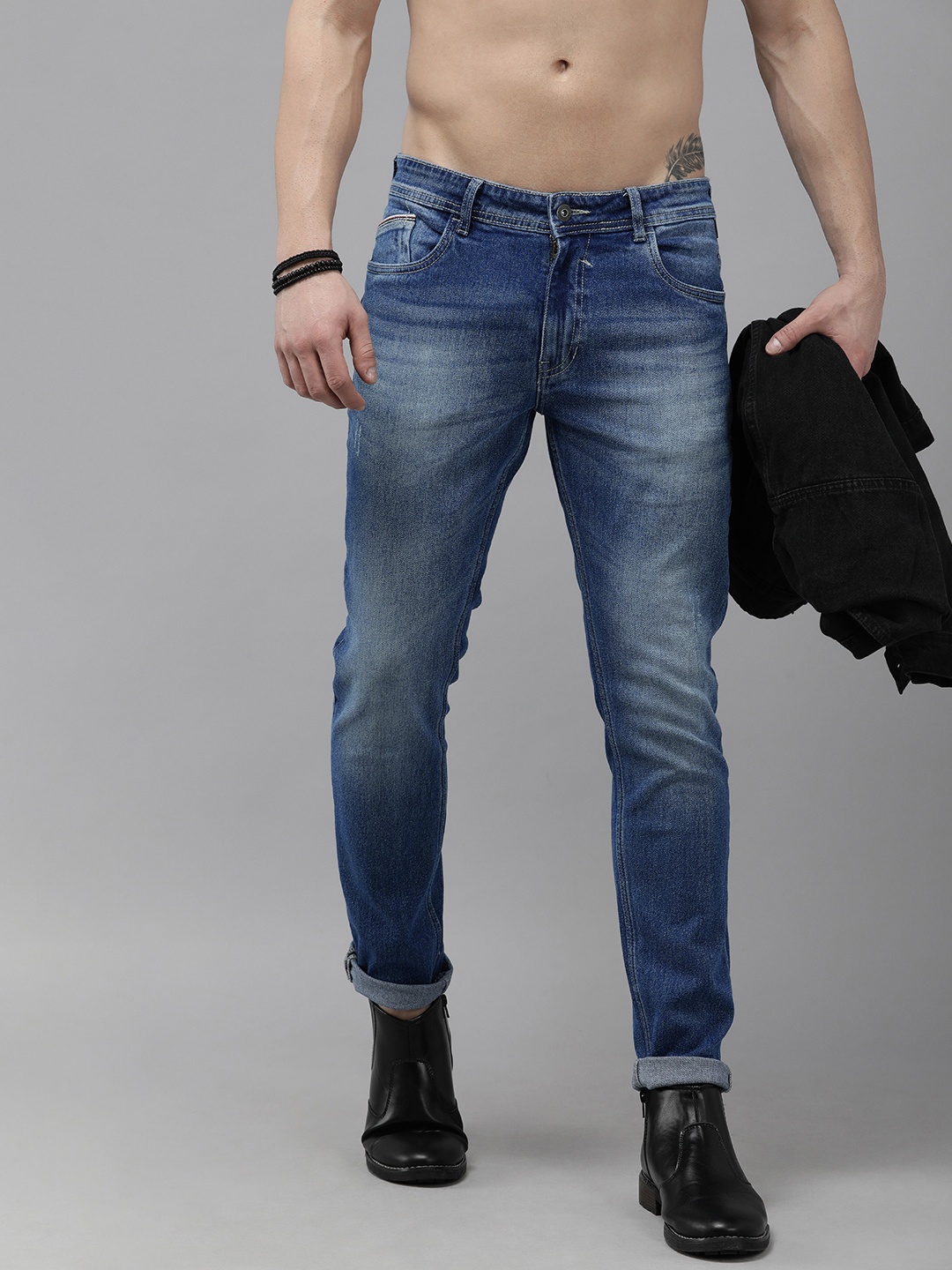 

The Roadster Lifestyle Co. Men Blue Slim Fit Heavy Fade Stretchable Casual Jeans