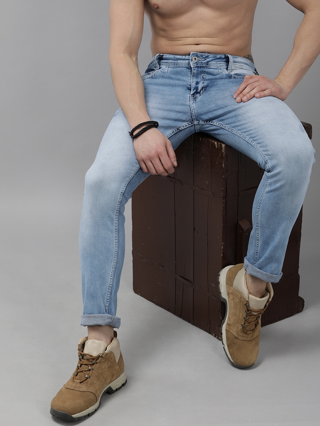 

The Roadster Lifestyle Co. Men Blue Slim Fit Heavy Fade Stretchable Casual Jeans