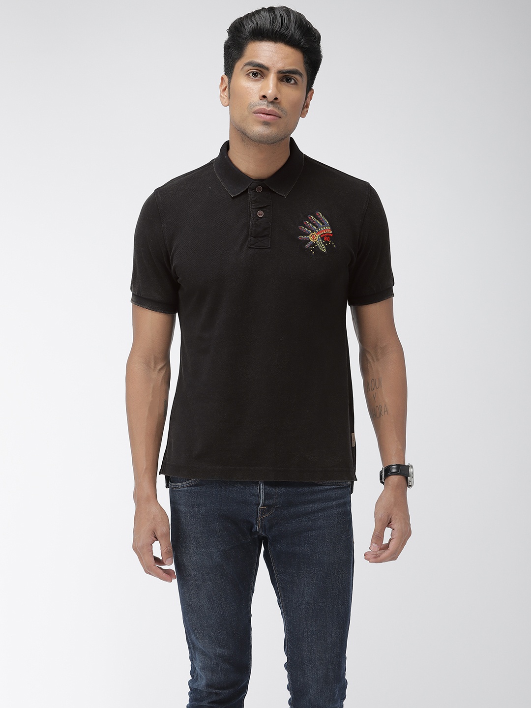 

Flying Machine Men Black Solid Polo Collar Knitted Pure Cotton T-shirt
