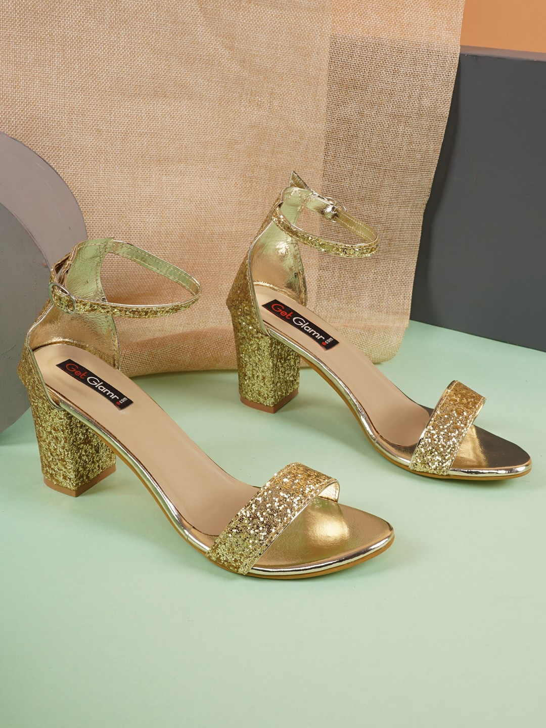 

Get Glamr Gold-Toned Ethnic Block Pumps