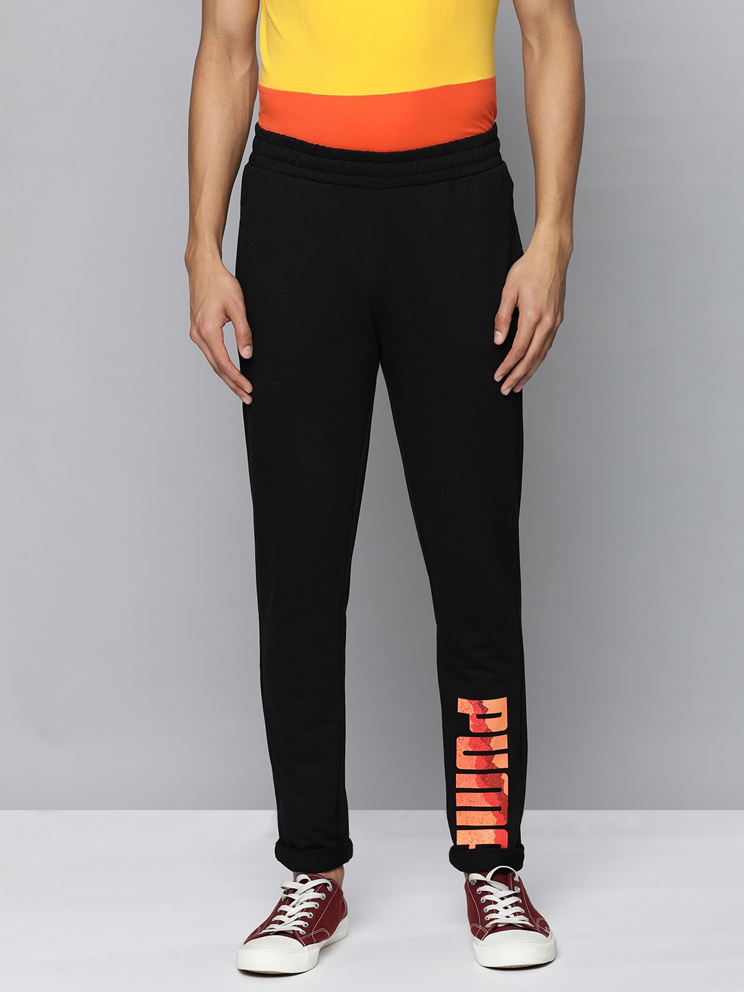 

Puma Men Typography Printed Zippered Slim Fit Regular Track Pants, Black