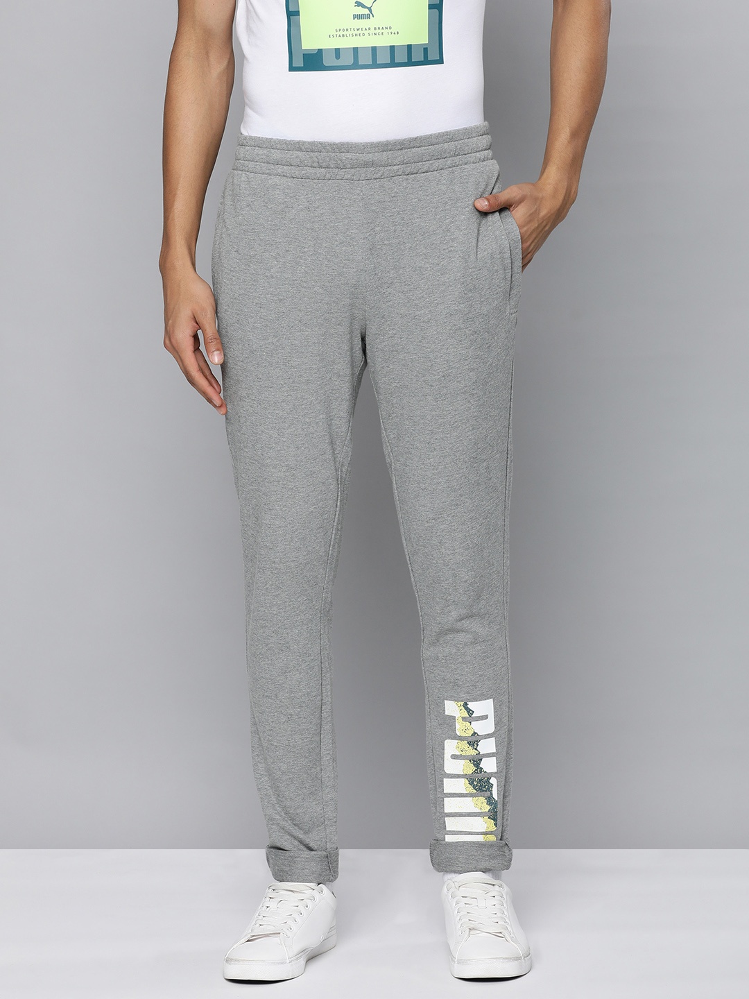 

Puma Men Grey Melange Typography Printed Zippered Slim Fit Regular Track Pants