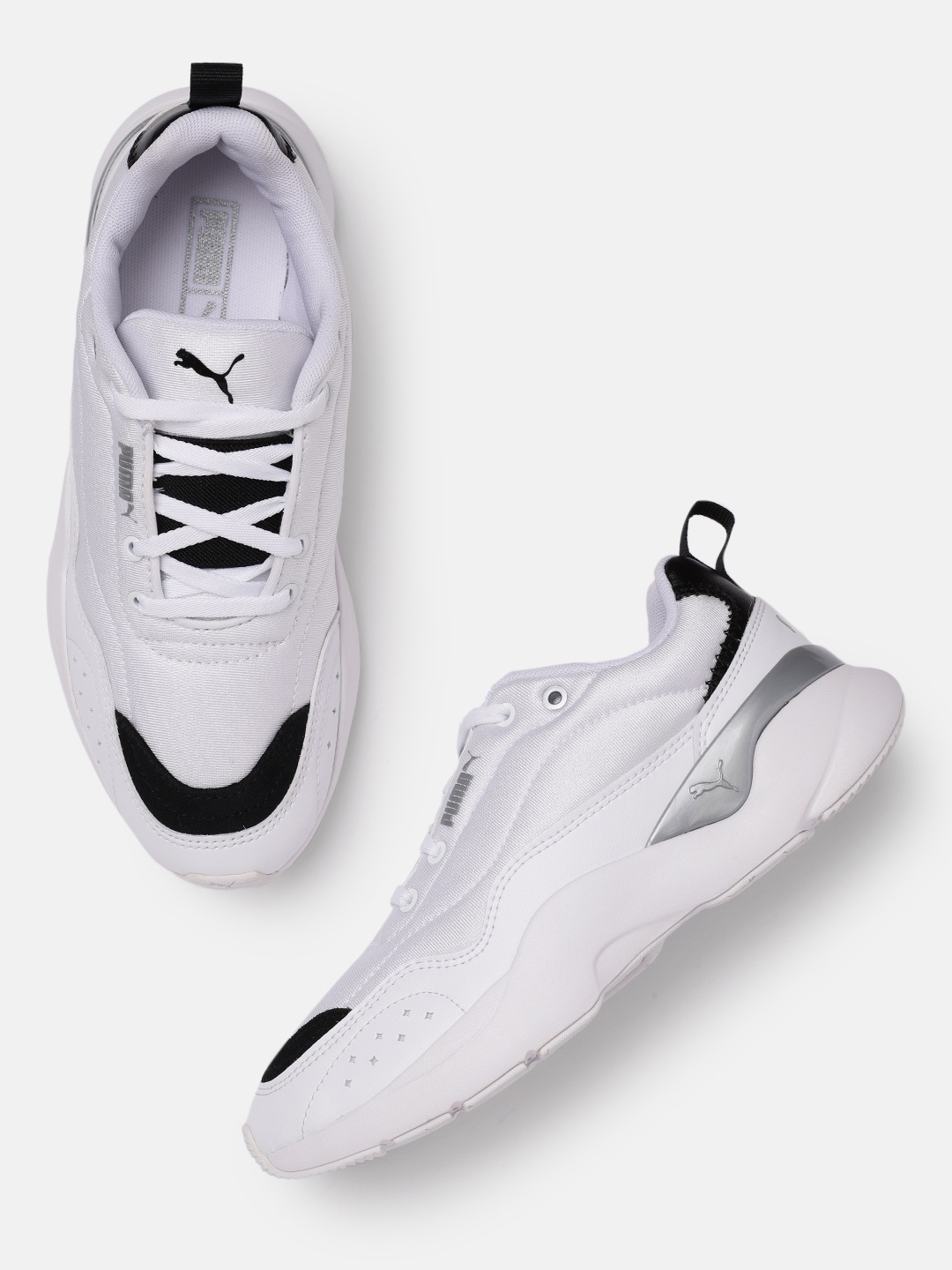 

Puma Women White Solid Sneakers