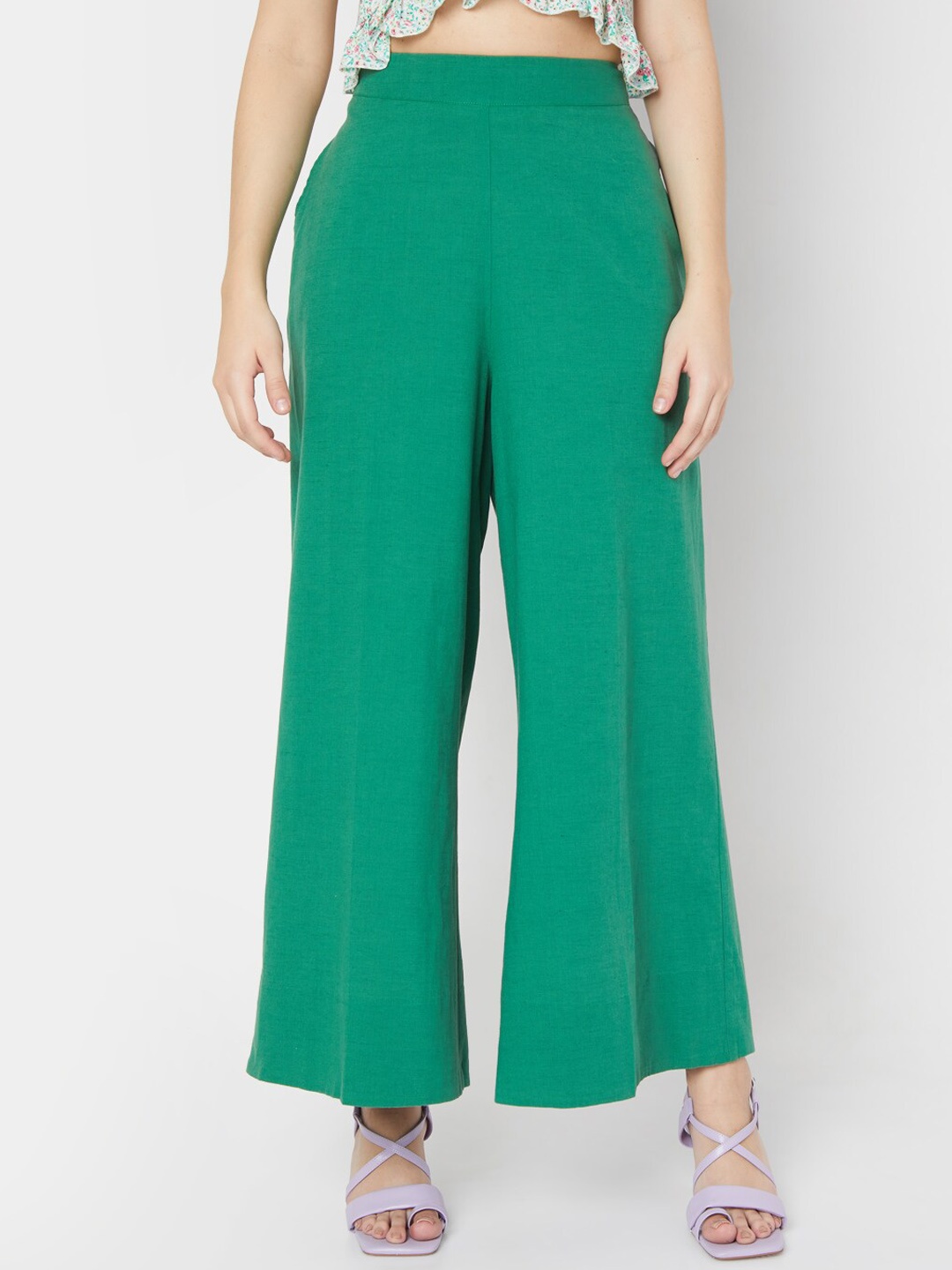 

Vero Moda Women Green Solid Flared High-Rise Trousers