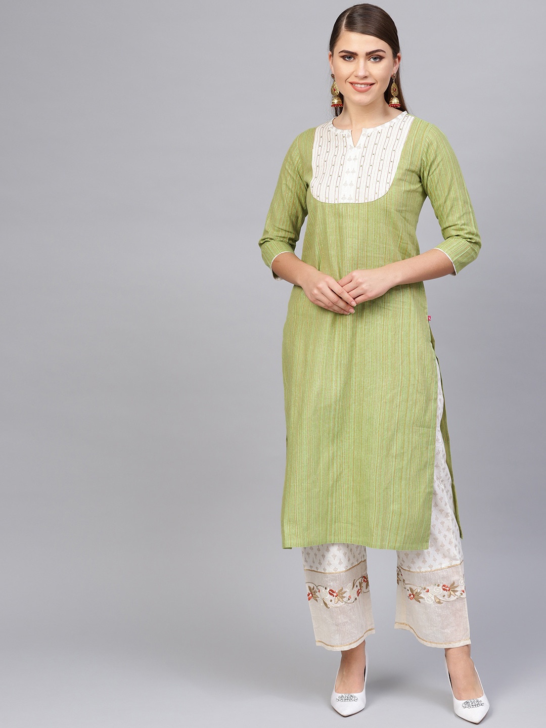 

Varanga Women Green Yoke Design Sequinned Kurta with Palazzos