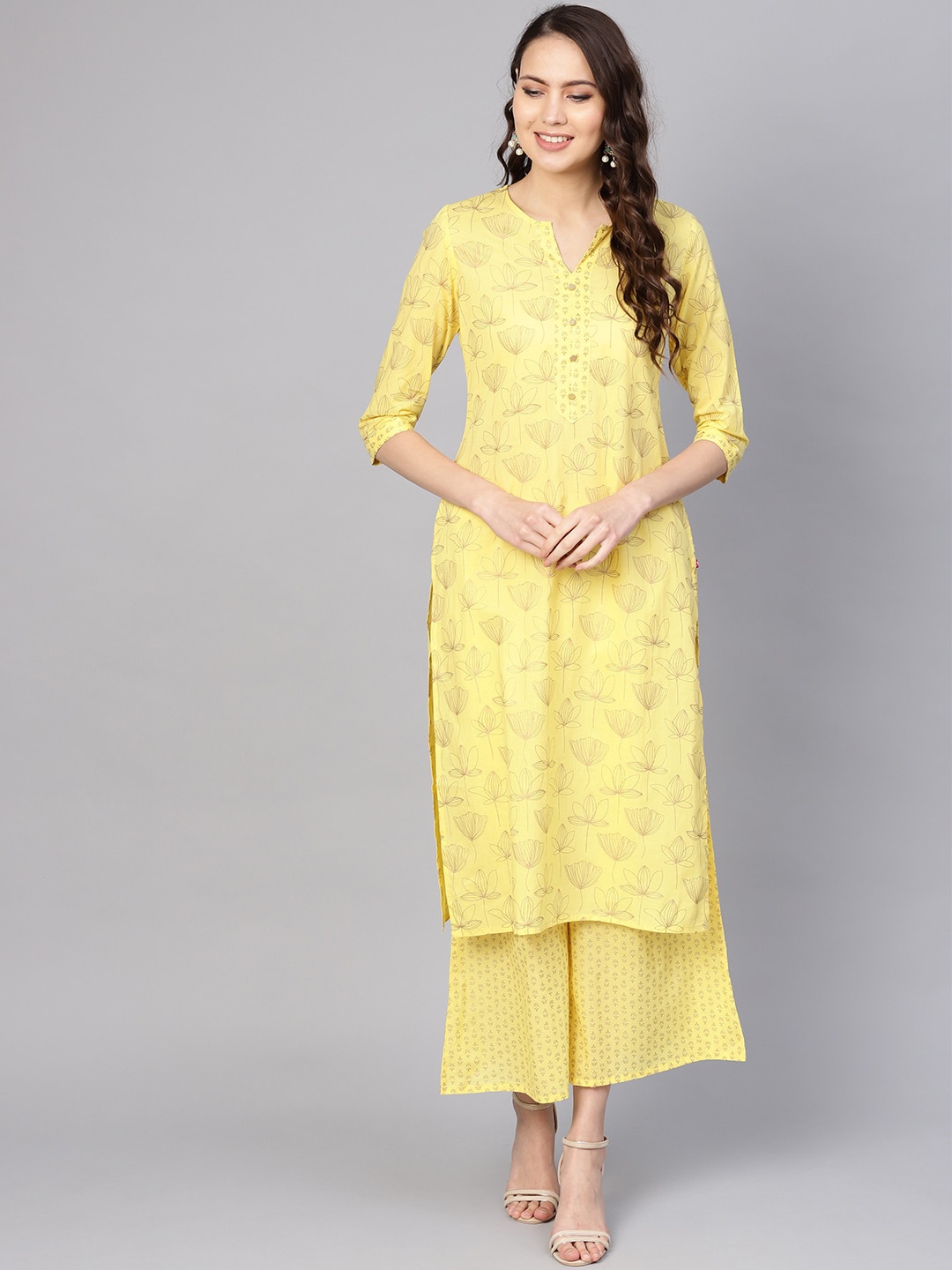 

Varanga Women Yellow Floral Printed Kurta with Palazzos