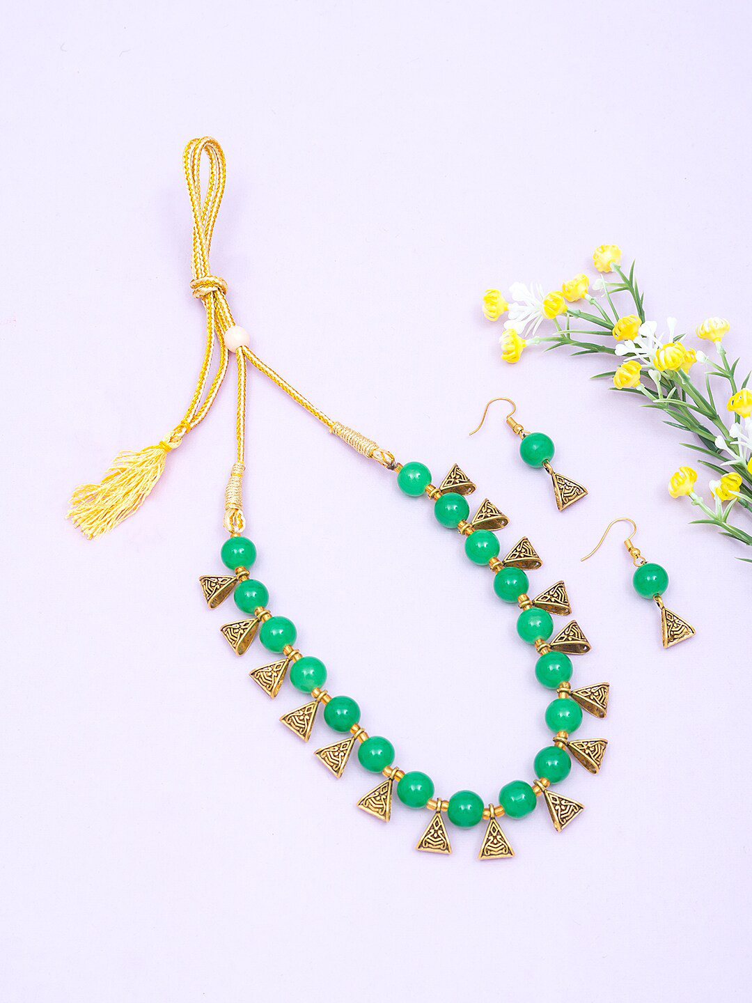 

Golden Peacock Gold-Toned & Green Beads Beaded Handcrafted Jewellery Set