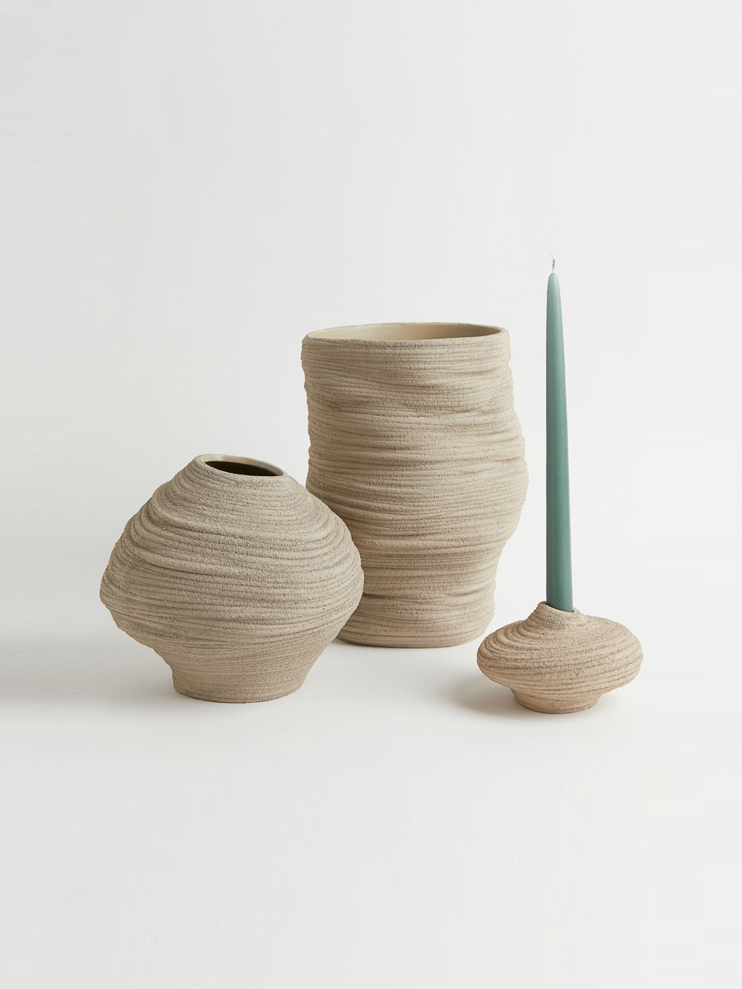 

H&M Beige Asymmetric Stoneware Candle Holder