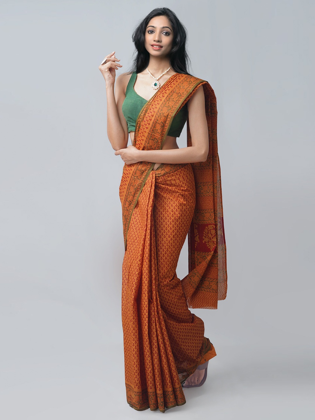 

Unnati Silks Orange & Green Floral Pure Cotton Block Print Saree
