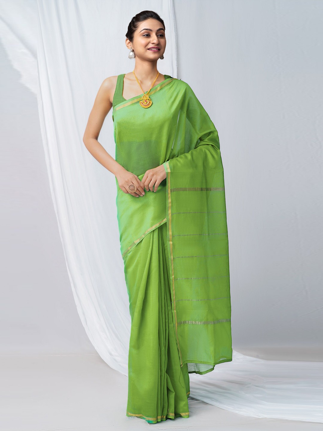 

Unnati Silks Green & Gold-Toned Woven Design Zari Silk Cotton Chanderi Saree