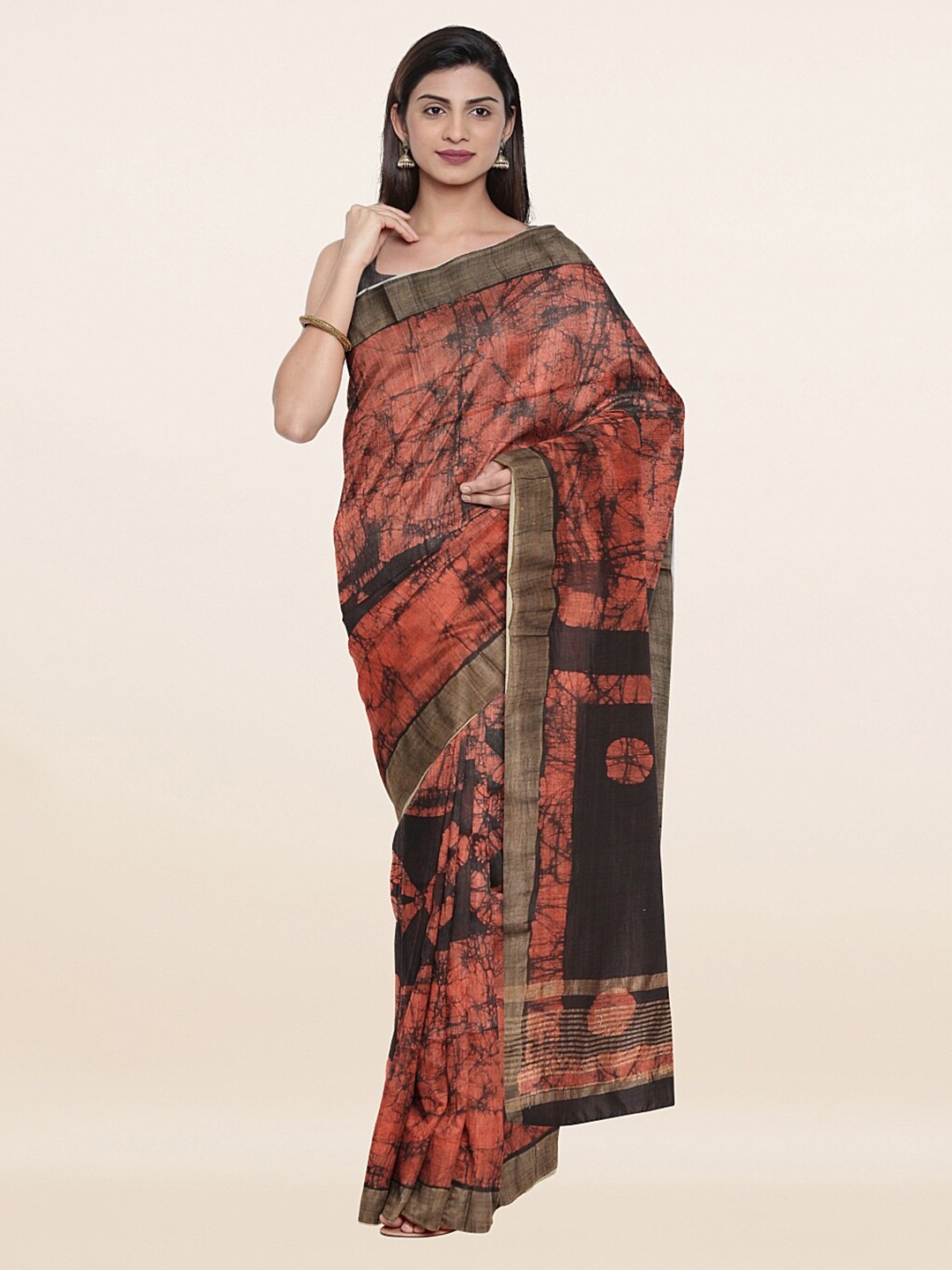 

Pothys Rust & Black Floral Jute Cotton Saree