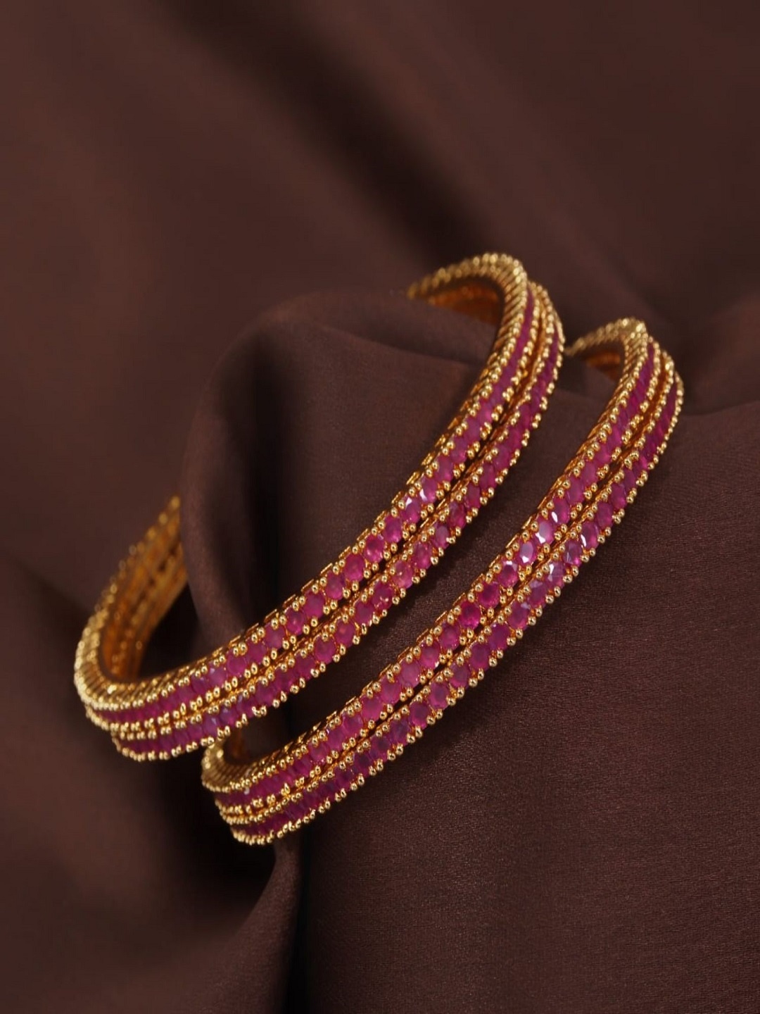 

I Jewels Women Pack Of 4 Gold-Plated & Maroon AD Studded Bangles