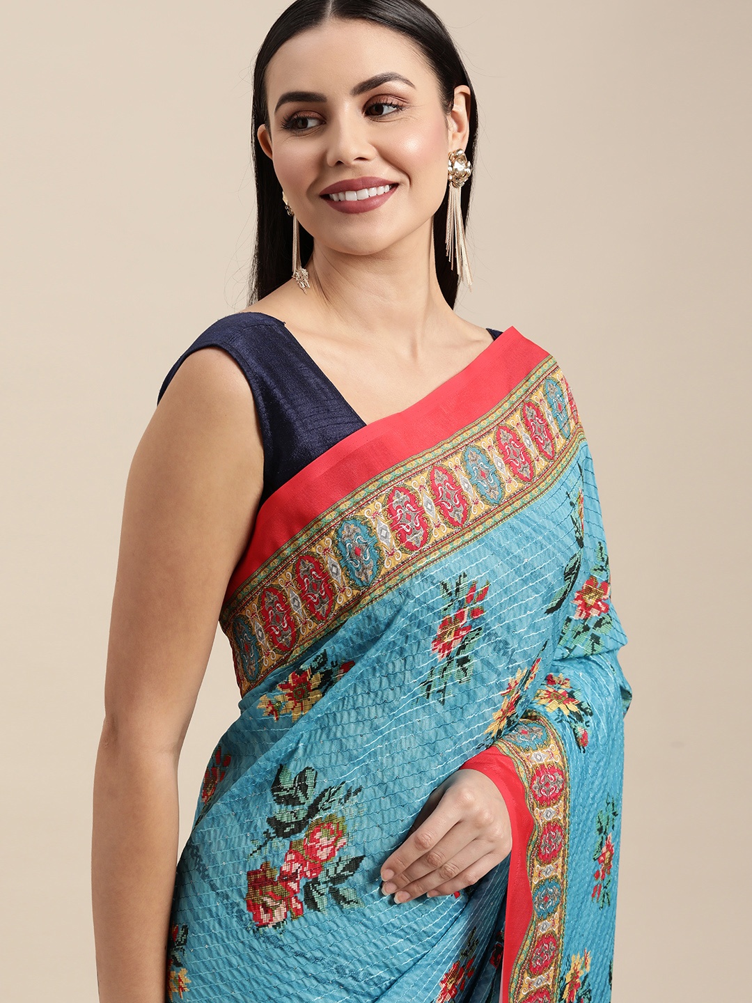 

VASTRANAND Blue & Orange Floral Sequinned Art Silk Saree