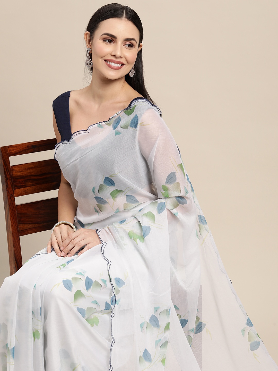

VASTRANAND White & Blue Floral Print Sequinned Pure Chiffon Saree