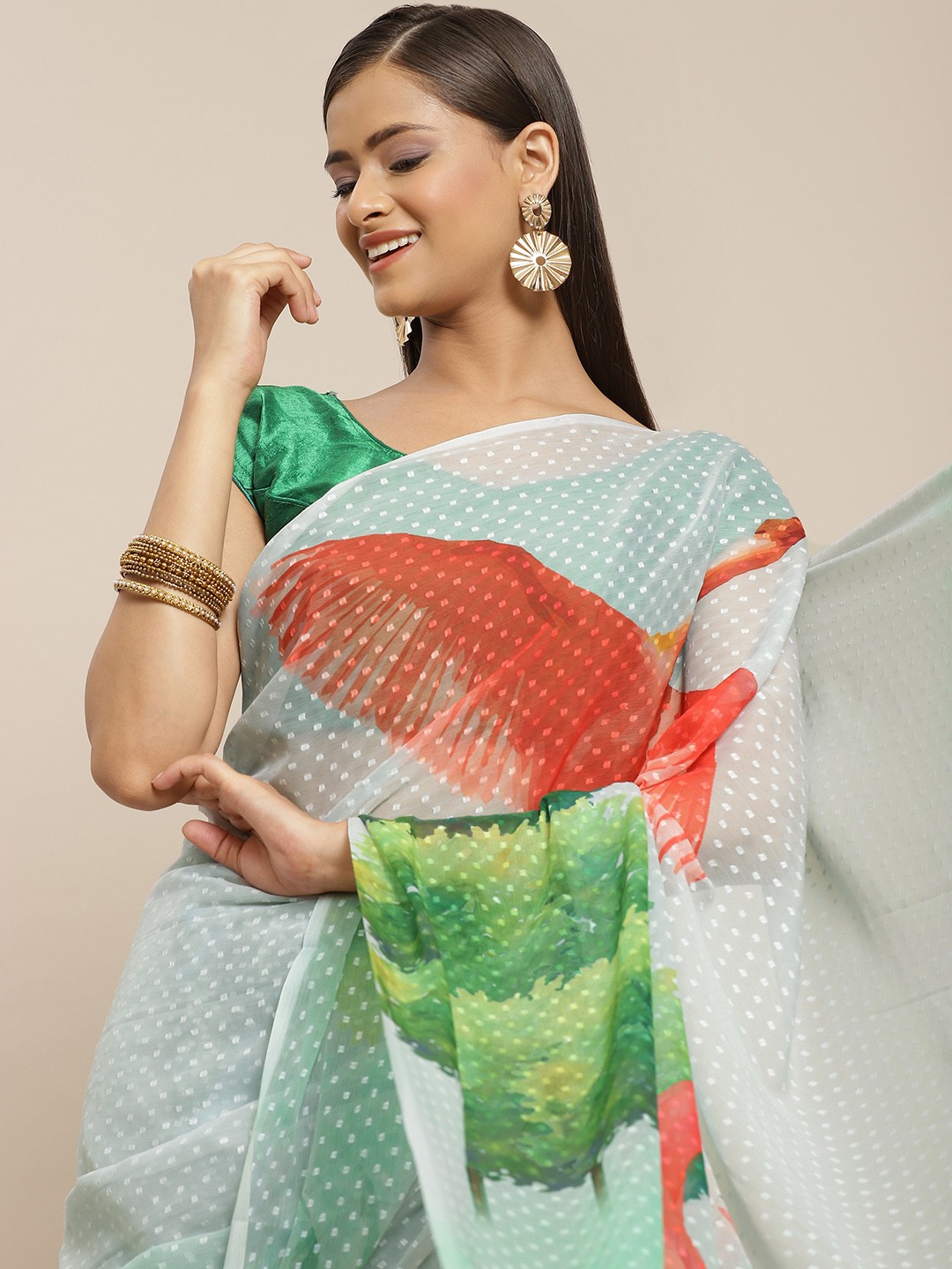 

Silk Land Blue & Green Conversational Print Chiffon Saree