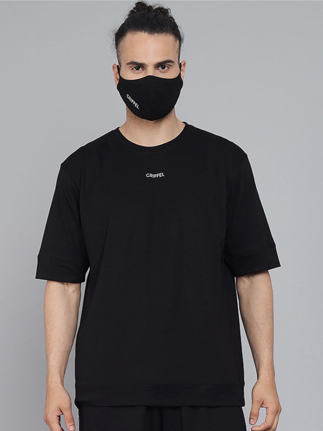 

GRIFFEL Men Black Oversized Solid T-shirt