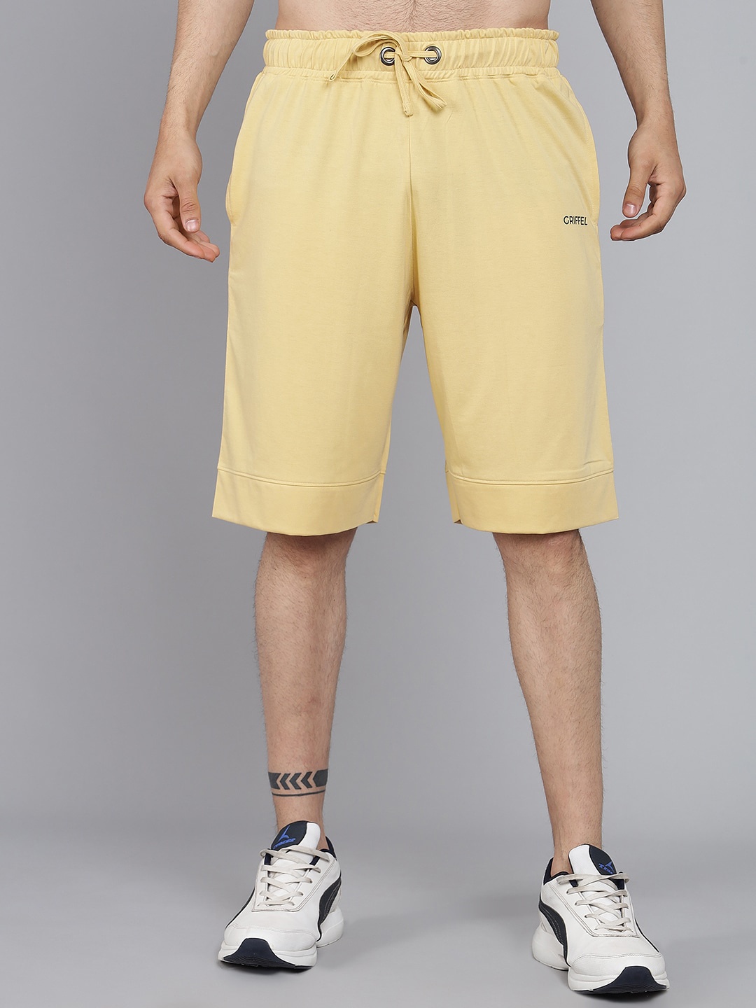 GRIFFEL Men Yellow Loose Fit Sports Shorts