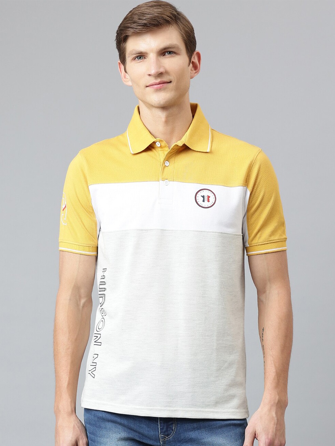 

Richlook Men Off White & Yellow Colourblocked Polo Collar T-shirt