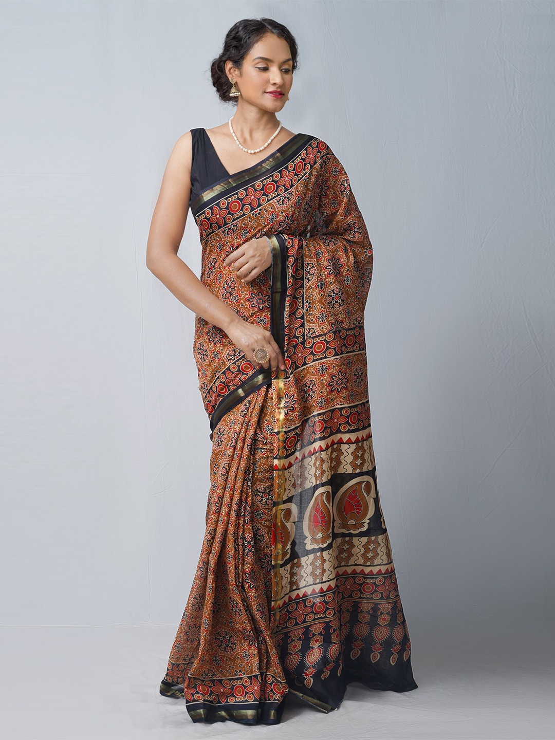 

Unnati Silks Brown & Red Pure Cotton Ajrakh Handloom Kota Saree