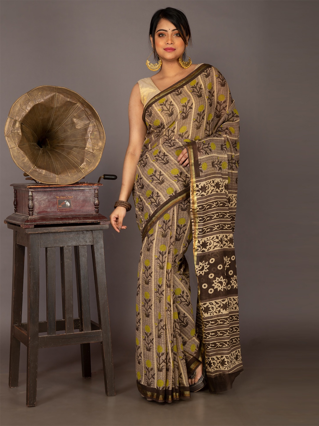 

Unnati Silks Brown & Yellow Zari Pure Cotton Ajrakh Handloom Kota Saree