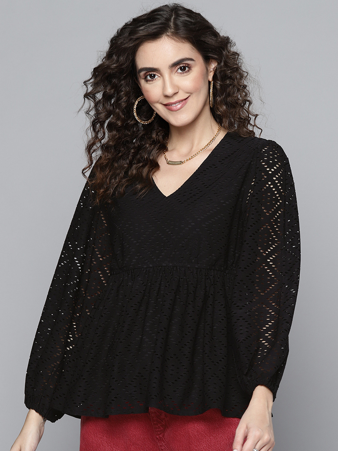 

SASSAFRAS Black Schiffli Peplum Top