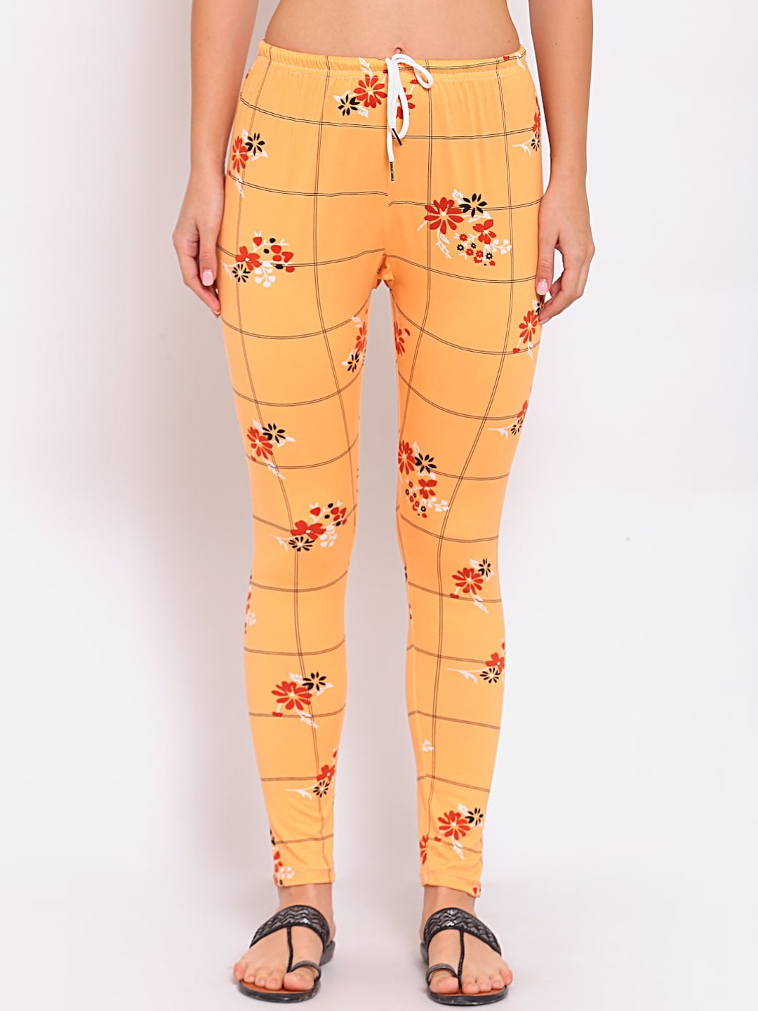 

KLOTTHE Women Orange Printed Comfort Fit Churidar Length Leggings