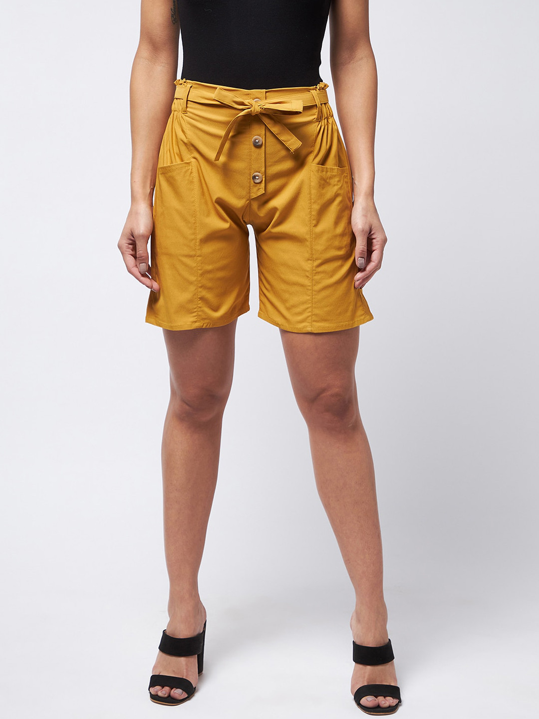 

Purple Feather Women Mustard Solid Regular Fit Shorts