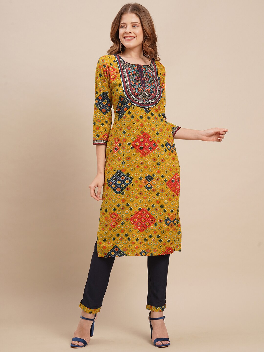 

FASHOR Women Mustard Yellow Ethnic Motifs Embroidered Mirror Work Kurta with Trousers