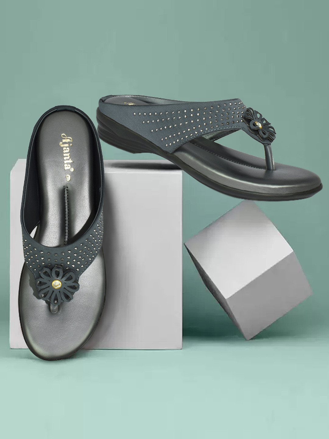 

Ajanta Women Grey Thong Flip-Flops