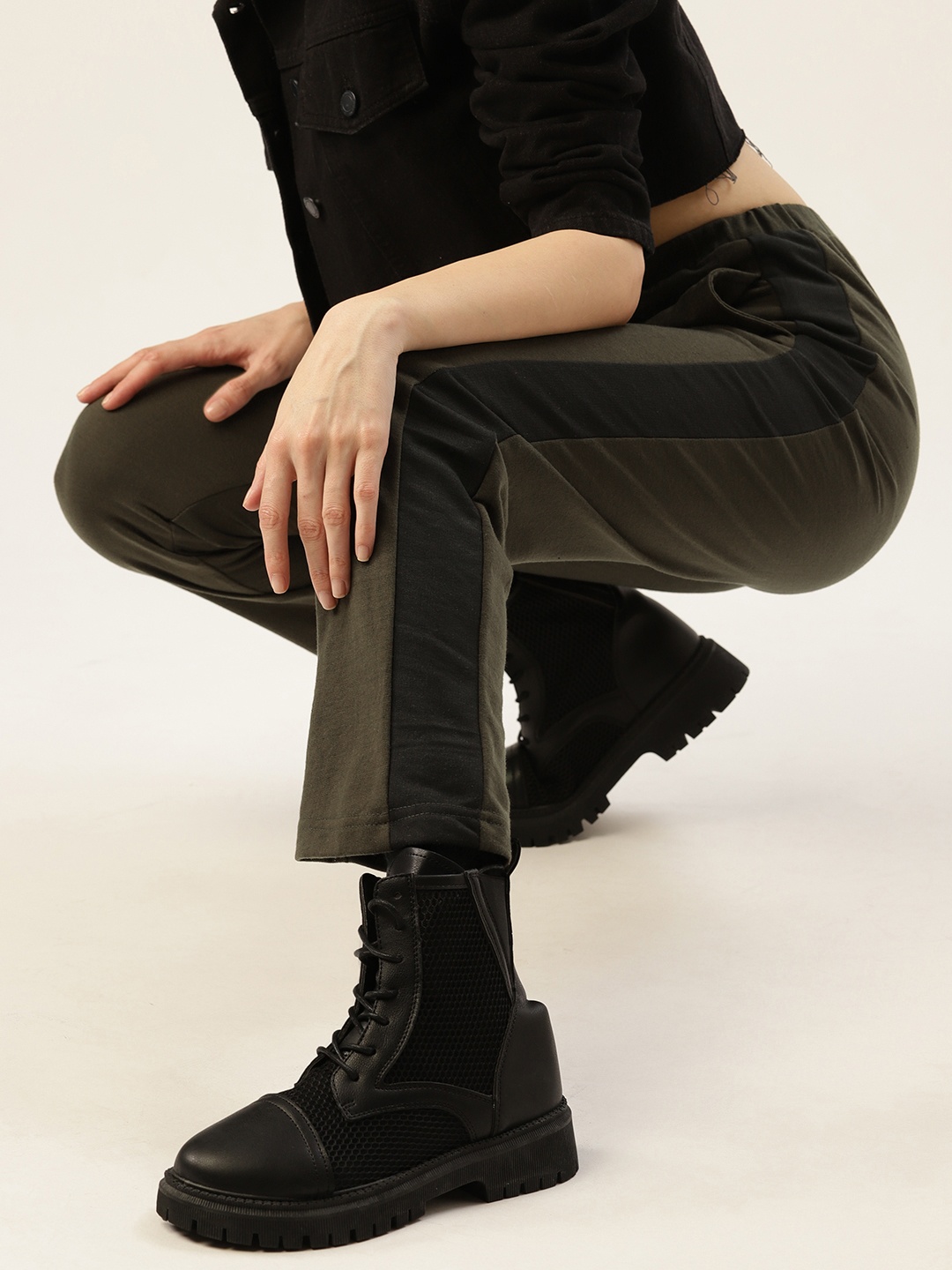

Kook N Keech Women Olive Green Solid Track Pants with Side Striped Detail