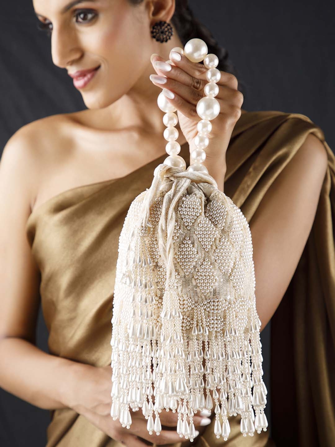 

Rubans Off-White Pearl Beaded & Sequin Embellish Handcrafted Potli Bag with Fringe Tassel